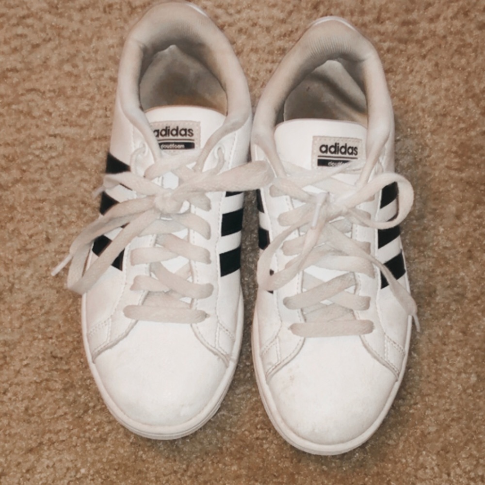 Black and white Adidas shoes